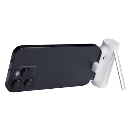 Travel-friendly Mini Charger with 5000mAh capacity, integrated Lightning connector, and stand, simplifying Apple device charging.